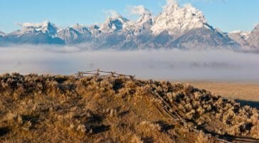 The tetons with a light dusting of snow.